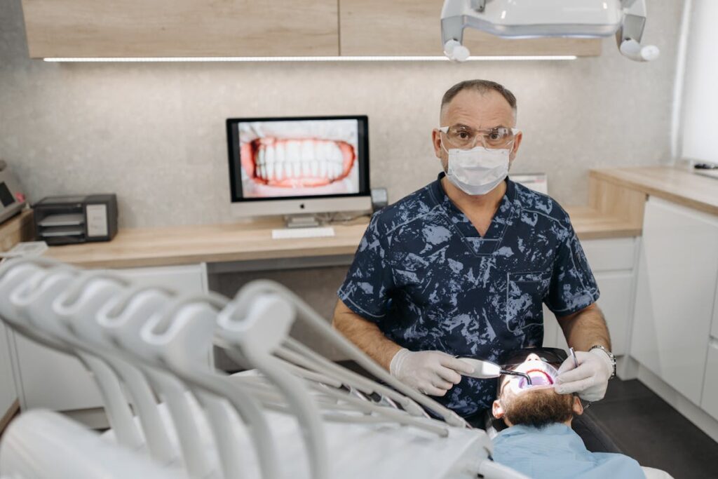 Modern dental clinic with dentist examining patient for oral health.